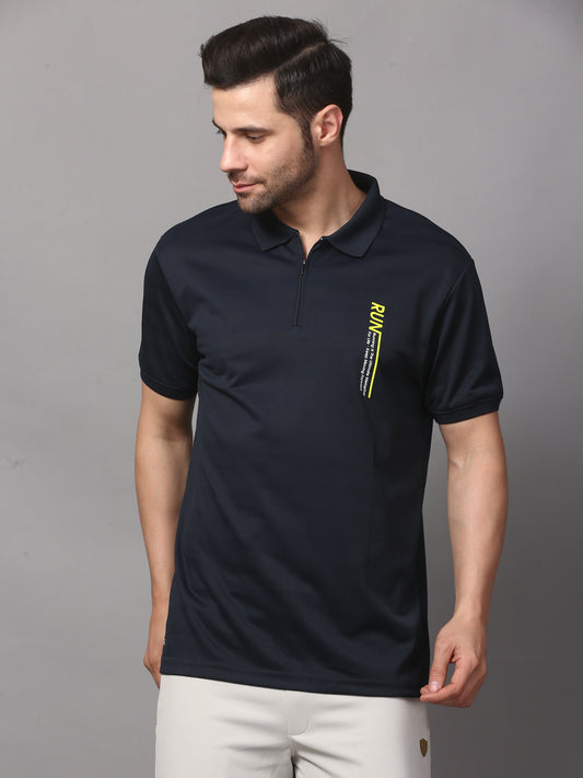 A navy blue polo t-shirt with a graphic on the chest.
